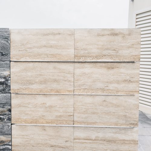 High-quality Travertine Blond slab displaying a warm golden and sunny beige background with natural porous textures.