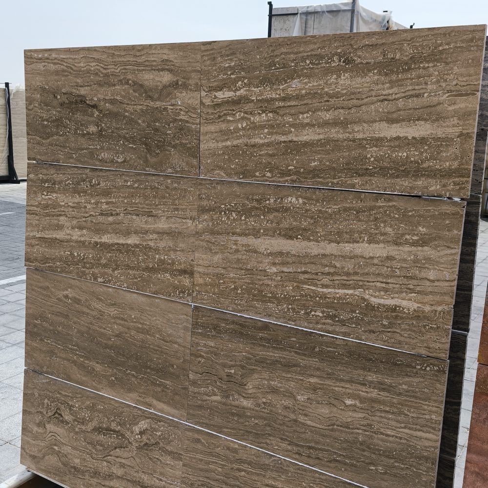 High-quality Travertine Notcha slab displaying rich dark walnut, deep beige, and subtle chocolate tones with a natural porous texture.