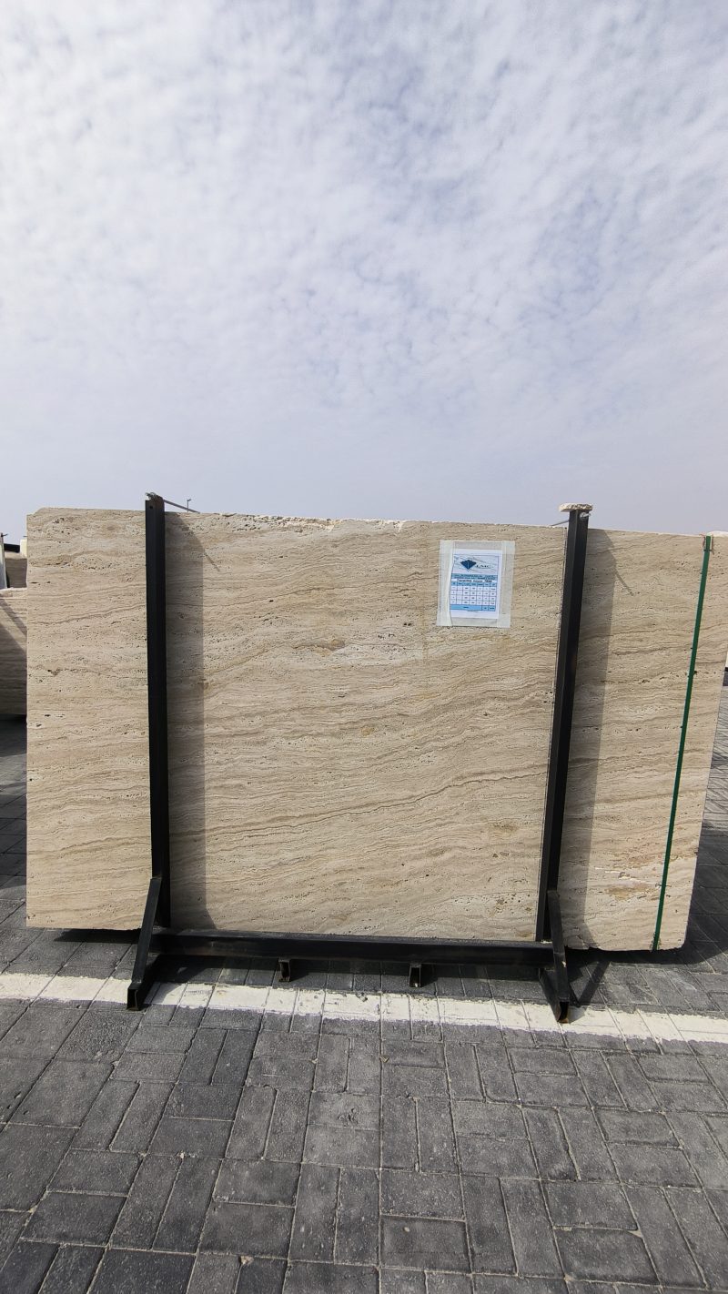 High-quality Travertine Kanyane slab displaying a luminous cream and warm beige background with soft natural textures.
