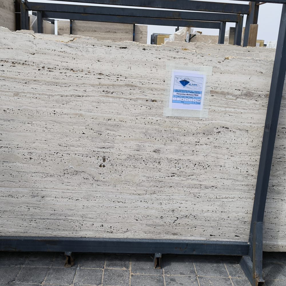 High-quality Travertine Romano slab showcasing a warm ivory and beige background with classic parallel linear veining.
