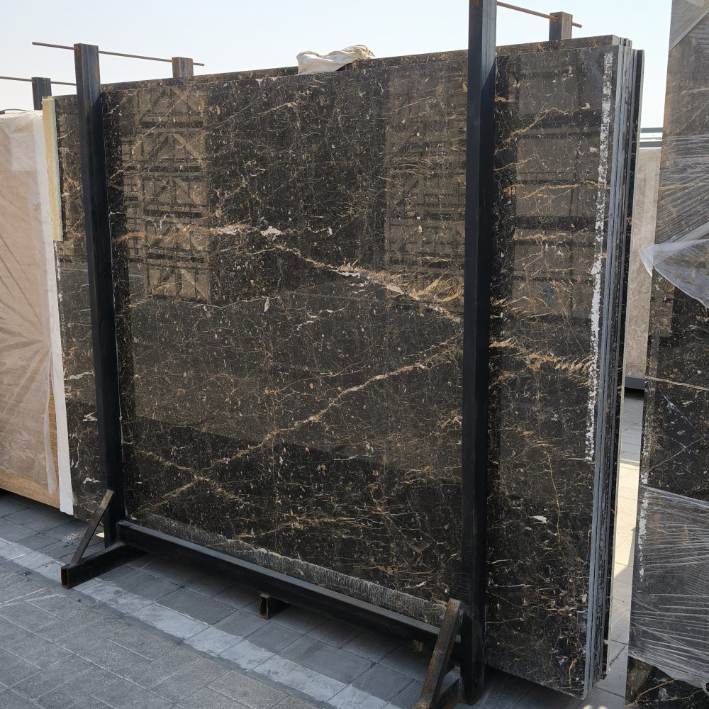 High-quality Golden Black Marble slab displaying a deep black background with striking white lines and random golden flakes.