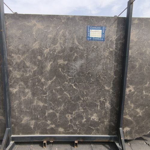 High-quality Armani Brown Marble slab displaying a rich bronze and deep brown background with fine white and golden veining.